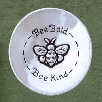 an image of a Pewter Bee Lovers Charm Bowl that has a bee in the center and says Bee Bold, Bee Kind and is 3 x 3 inches in diameter