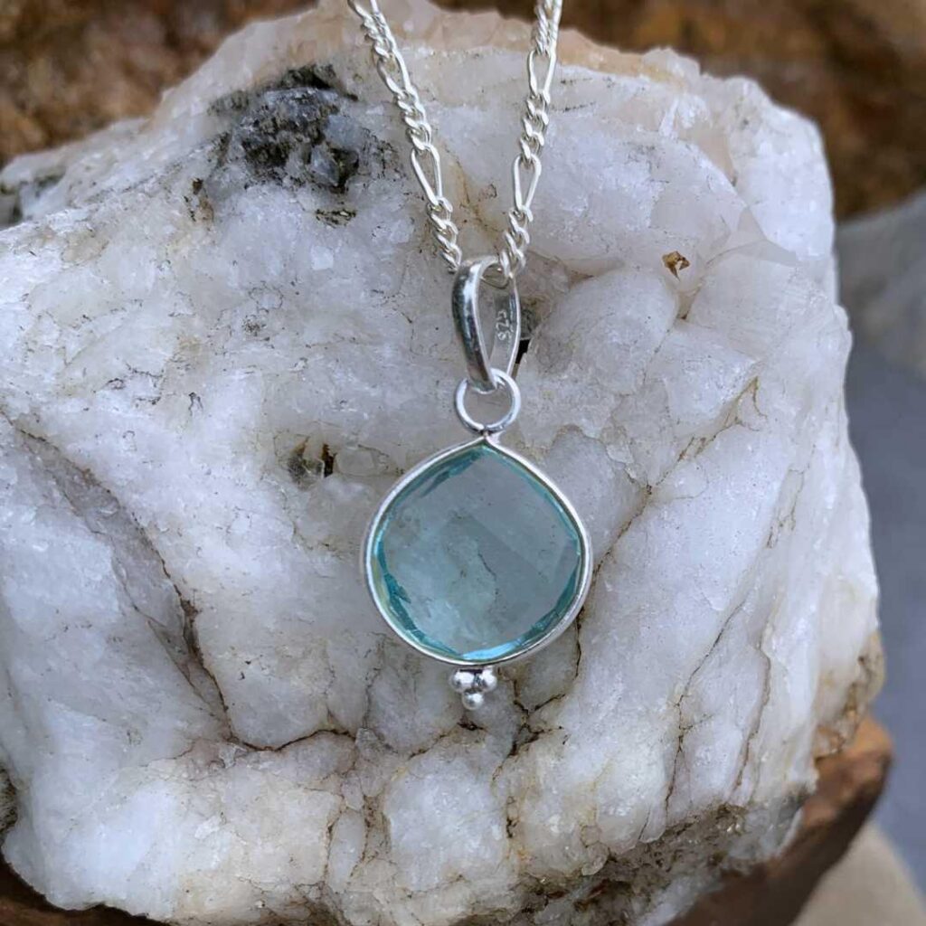 Petite Faceted Blue Topaz and Sterling Silver Pendant - GLE-Good Living ...
