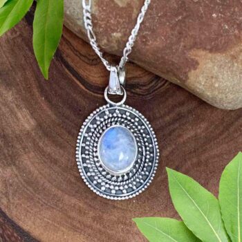 an image of an oval Rainbow Moonstone and Sterling Silver Ornate Pendant