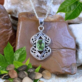 An image of a Oval Peridot and Filigree Sterling Silver Pendant