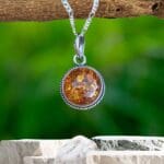 an image of a Round Amber and Sterling Silver Pendant