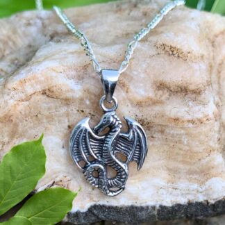 an image of a Sterling Silver Dragon Pendant with its' wings open