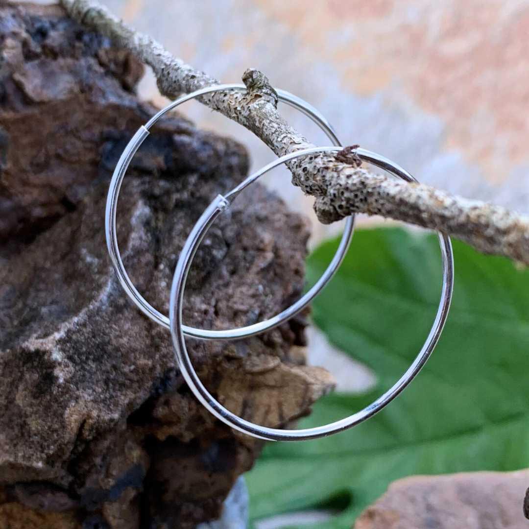 an image of a pair of Sterling Silver 1.4 inch Continuous Hoop Earrings