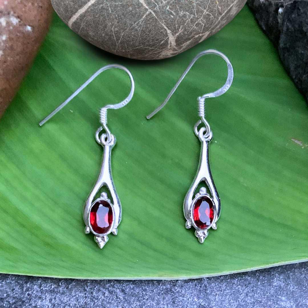 an image of a pair of Polished Sterling Silver and Oval Garnet Earrings