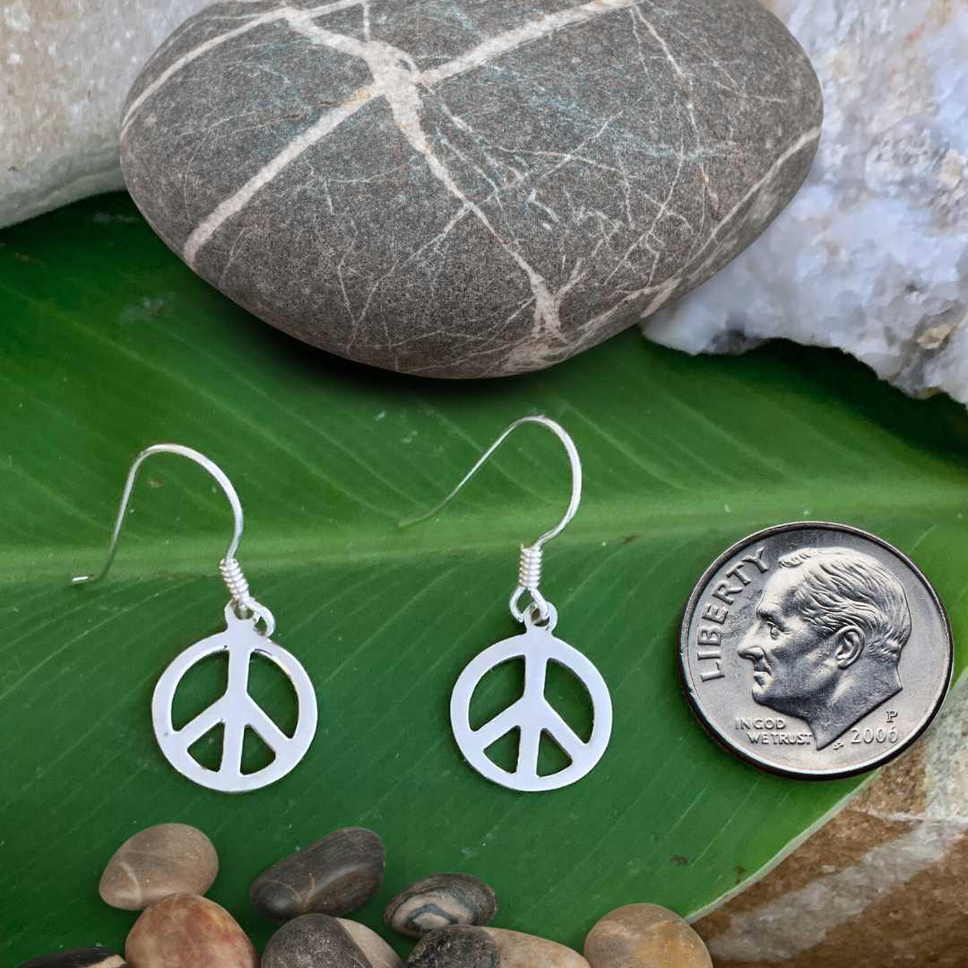 an image of a pair of Sterling Silver Peace Sign Earrings next to a dime