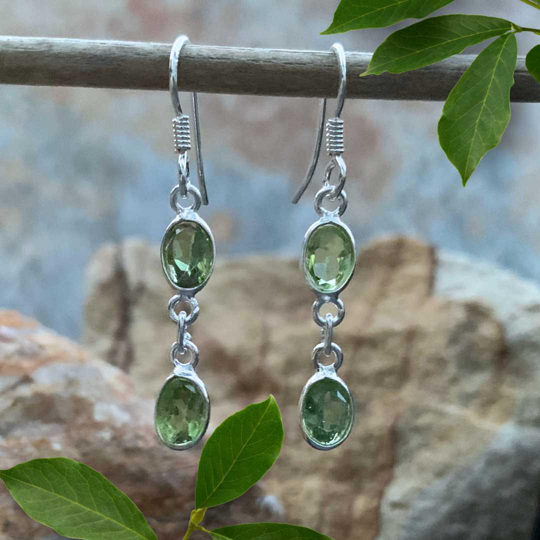 An image of a pair of Double Faceted Peridot and Sterling Silver Earrings