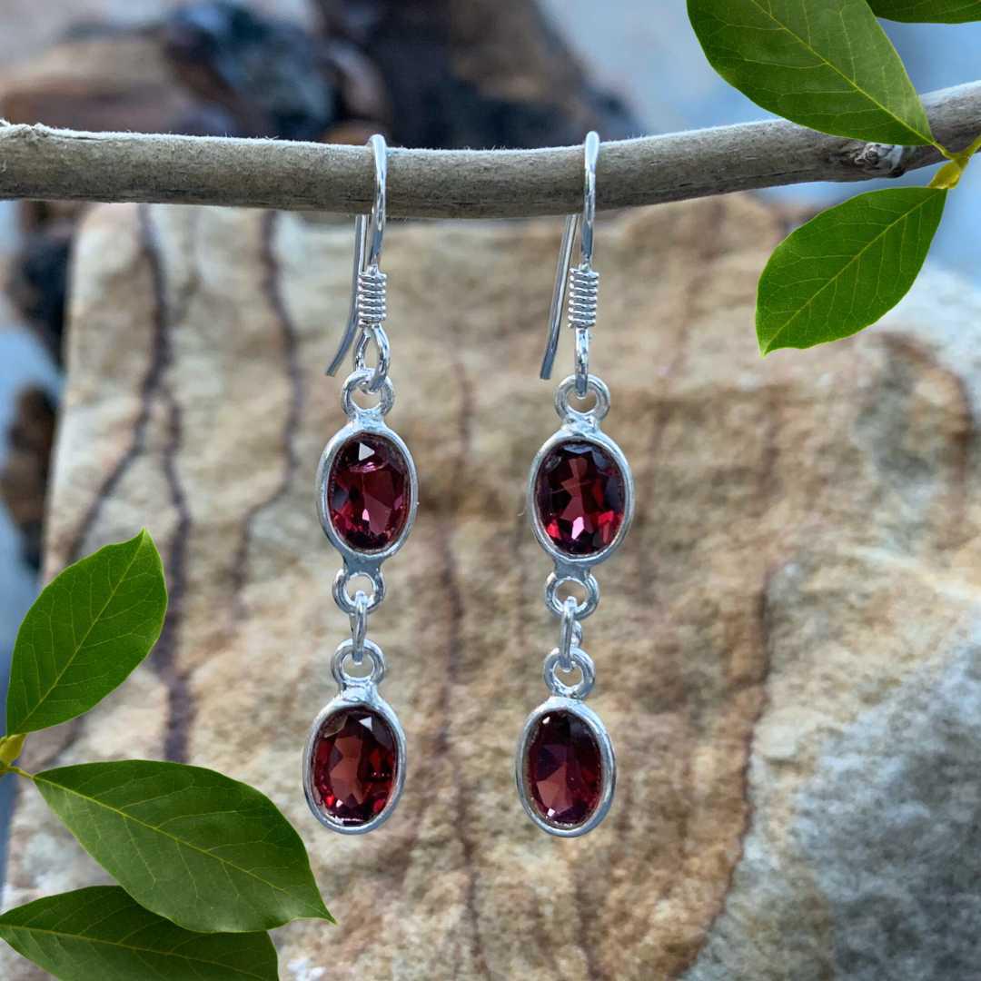 an image of a pair of Double Faceted Garnet and Sterling Silver Dangle Earrings