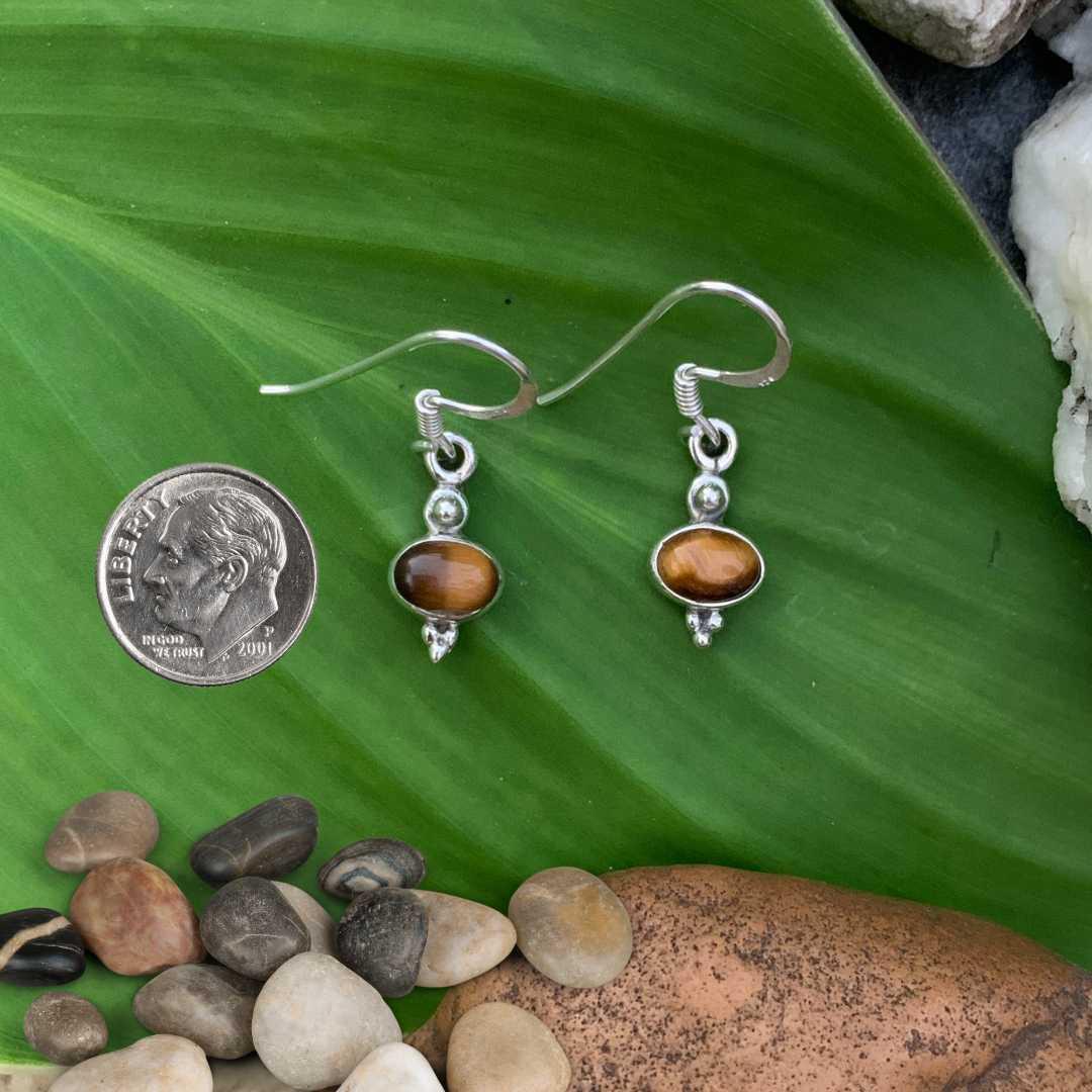 an image of a pair of Dainty Oval Tiger's Eye and Sterling Silver Earrings next to a dime