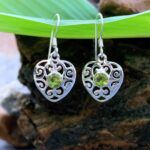 an image of a pair of Filigree Sterling Silver Peridot Heart Dangle Earrings