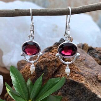an image of a pair of Oval Garnet with tiny Pearl and Sterling Silver Earrings
