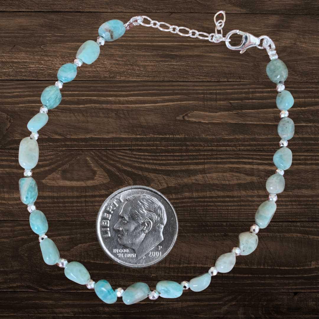 an image of an Amazonite Beads and Sterling Silver Bracelet next to a dime