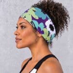 an image of a Purple and Turquoise Flowers Infinity Bandana Head Wrap on an AI generated model