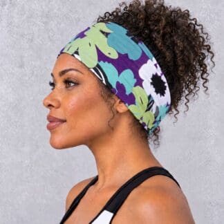 an image of a Purple and Turquoise Flowers Infinity Bandana Head Wrap on an AI generated model