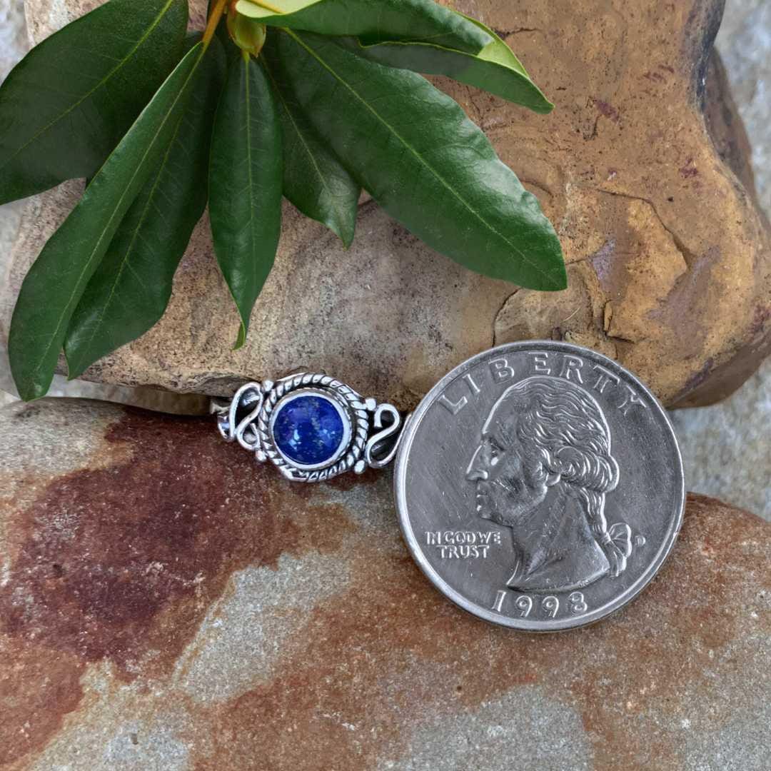an image of a Petite Round Lapis Lazuli and Sterling Silver Ring next to a quarter