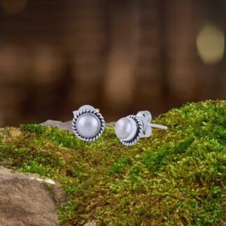 an image of a pair of Pearl and Sterling Silver Round Stud Earrings