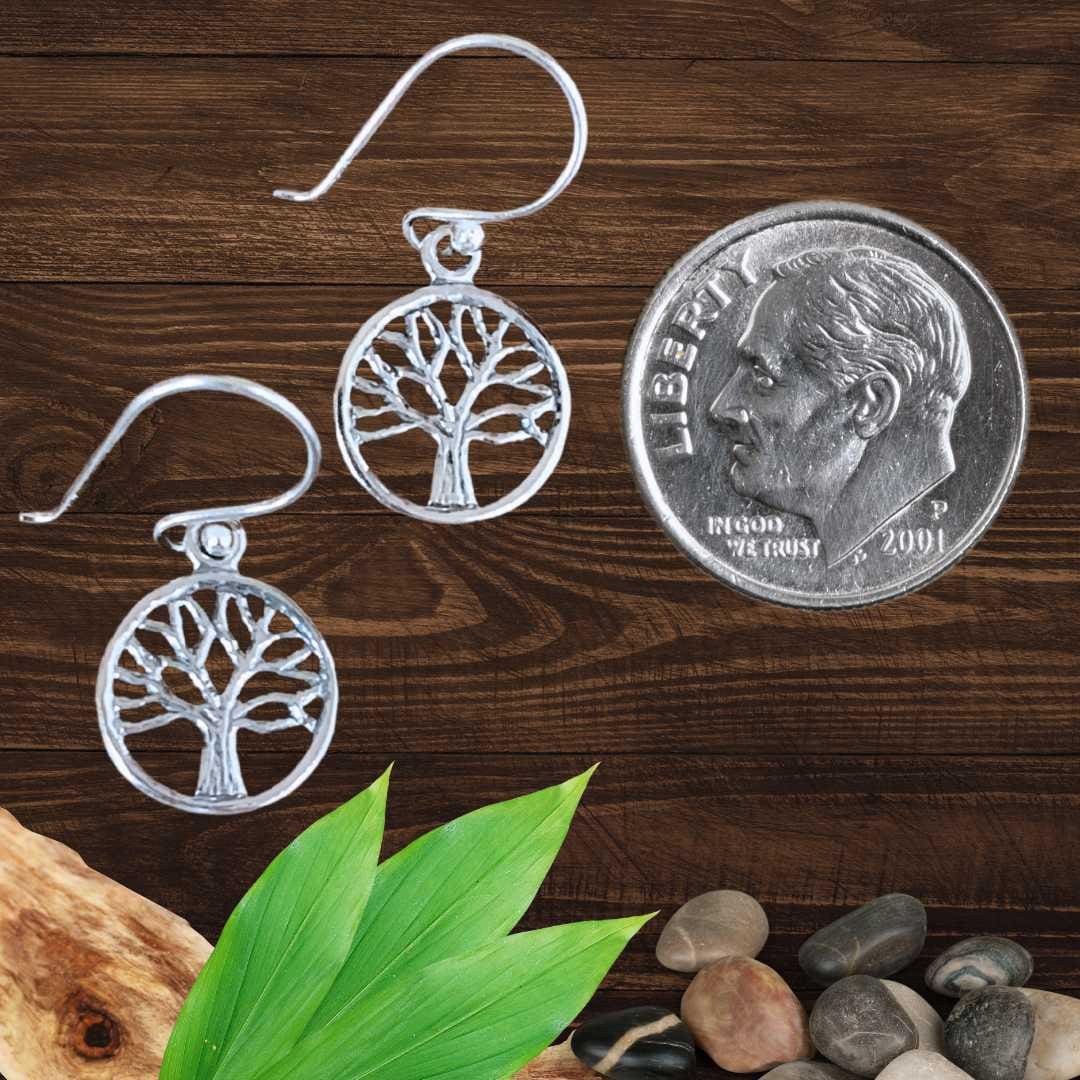 an image of a pair of Petite Sterling Silver Tree Of Life Earrings next to a dime