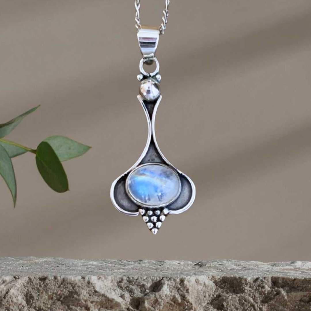 Oval Rainbow Moonstone and Sterling Silver Beaded Pendant