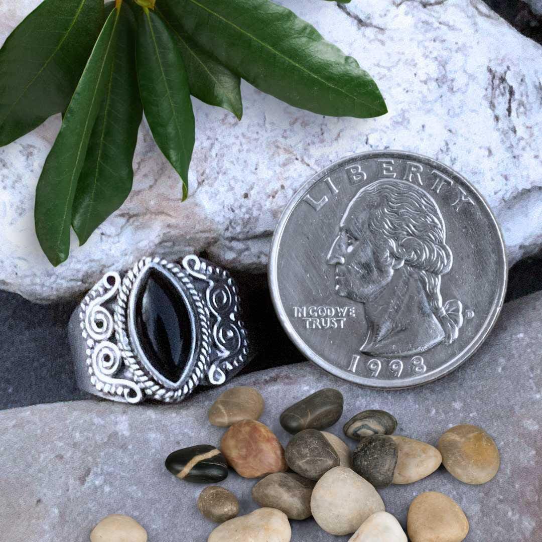 an image of a Marquise Black Onyx and Sterling Silver Ring next to a quarter
