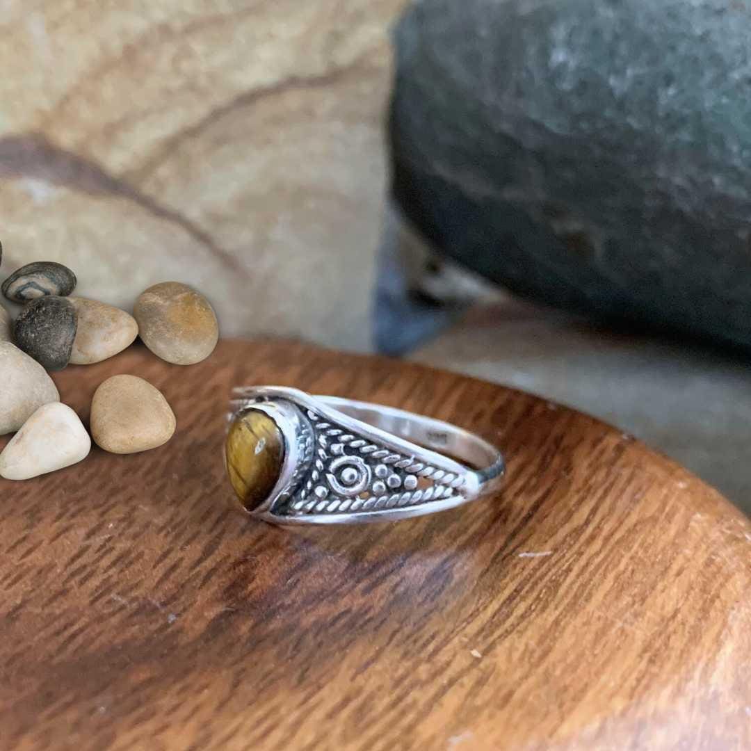 an image of a side view of a Teardrop Tiger's Eye and Sterling Silver Ring