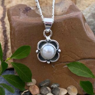 an image of a Dainty Pearl Sterling Silver Floral Pendant