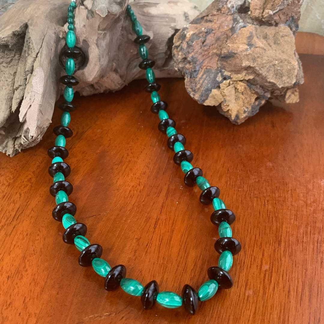 an image of a Malachite and Black Onyx Beaded Necklace with malachite barrel beads and black onyx saucer beads