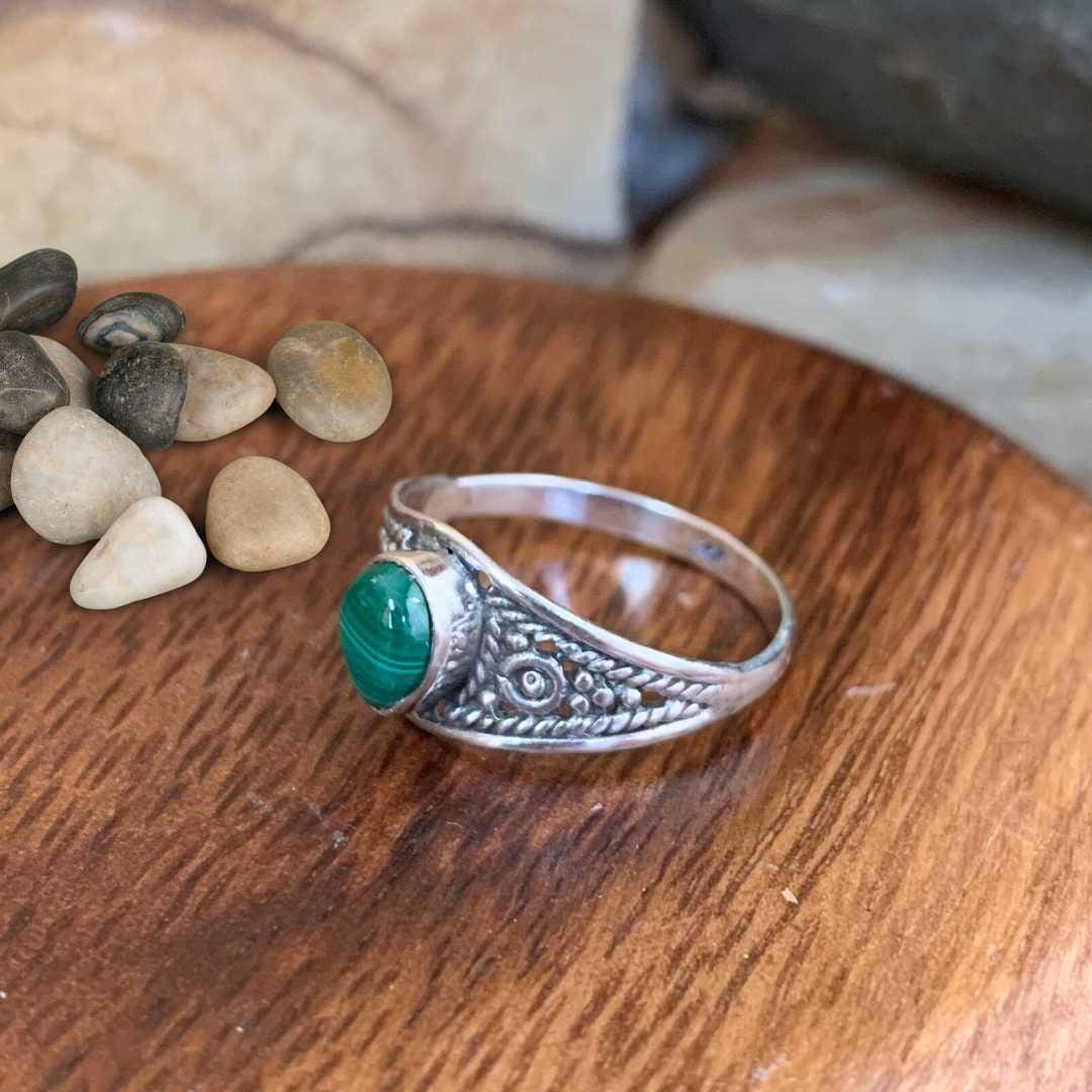an image of a side view of a Teardrop Malachite and Sterling Silver Ring