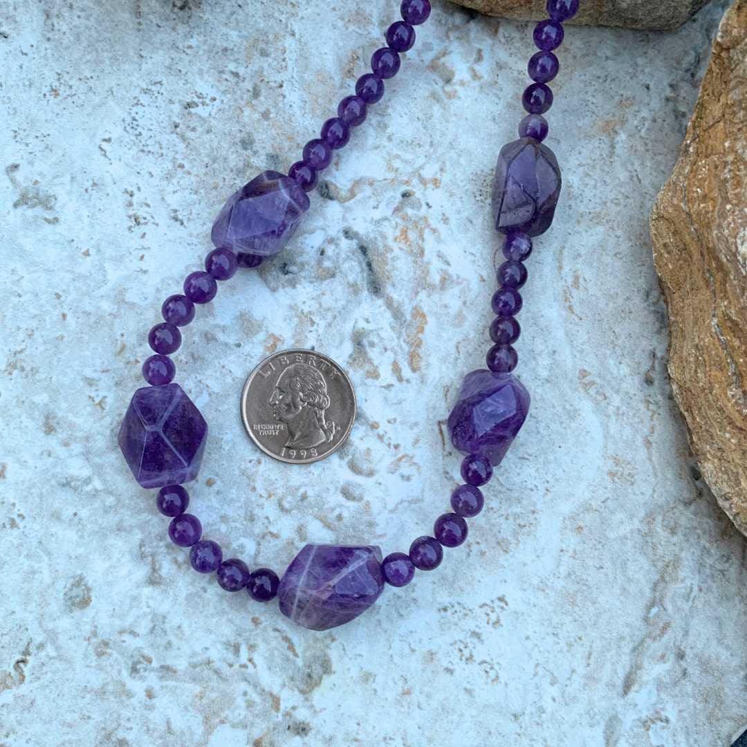 an image of a Amethyst Beaded Statement Necklace next to a quarter