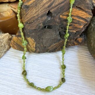 an image of our Peridot Nugget and Teardrop Beads Necklace