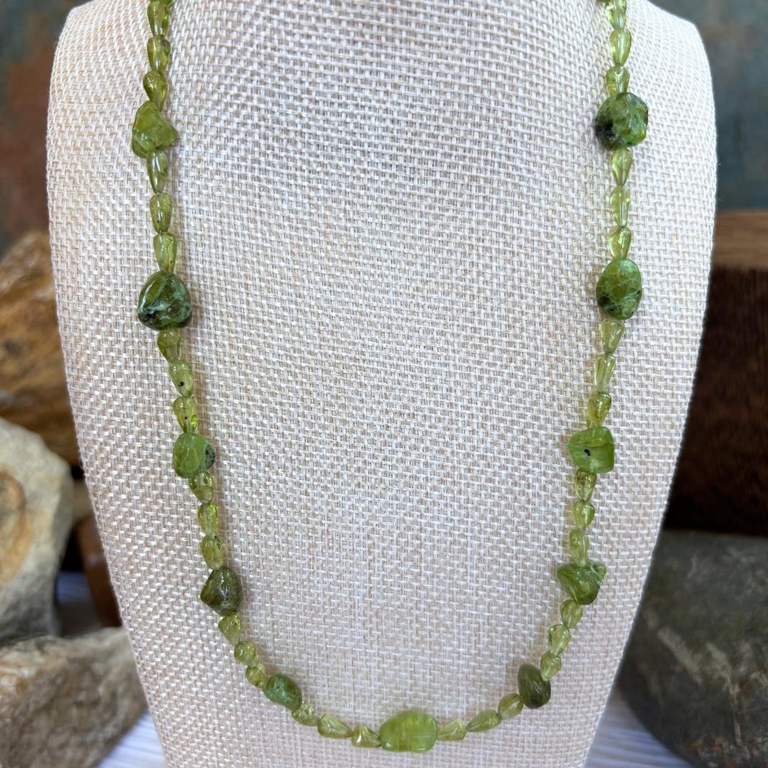 an image of our Peridot Nugget and Teardrop Beads Necklace