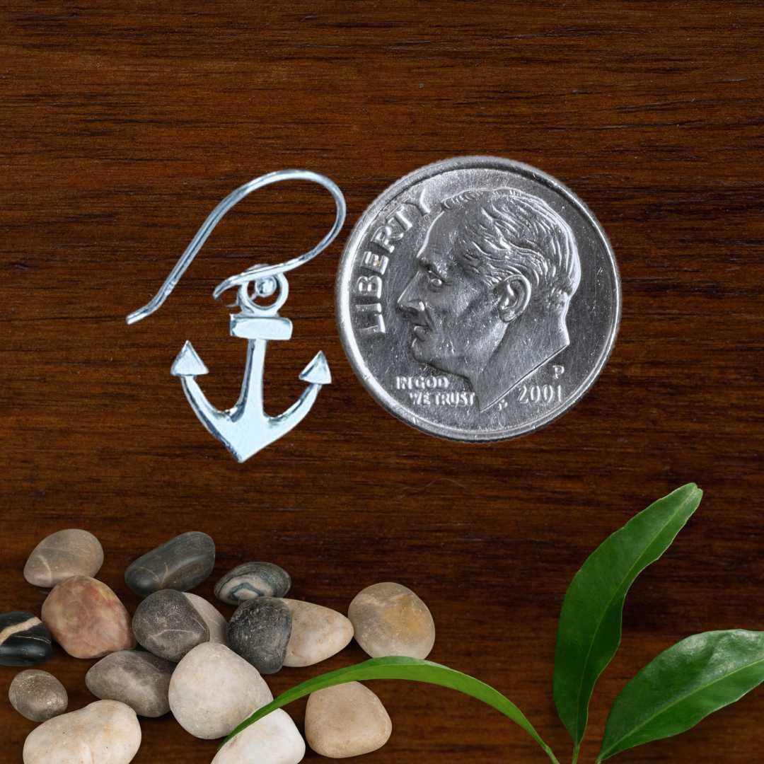 an image of a pair of Sterling Silver Anchor Earrings with a dime