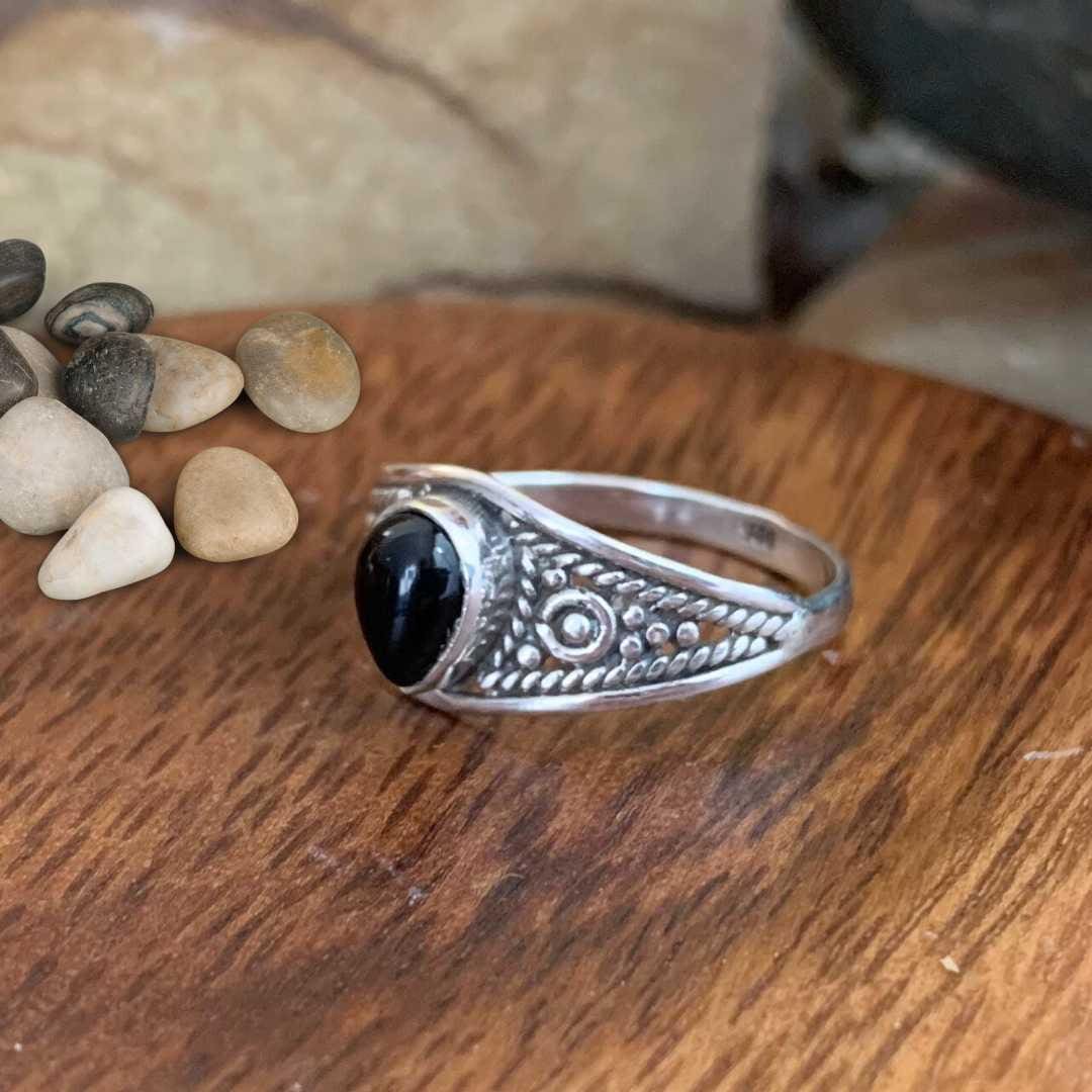 an image of a side view of a Teardrop Black Onyx and Sterling Silver Ring