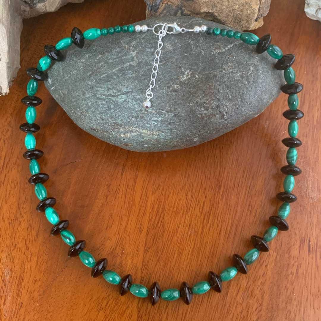 an image of a Malachite and Black Onyx Beaded Necklace with malachite barrel beads and black onyx saucer beads
