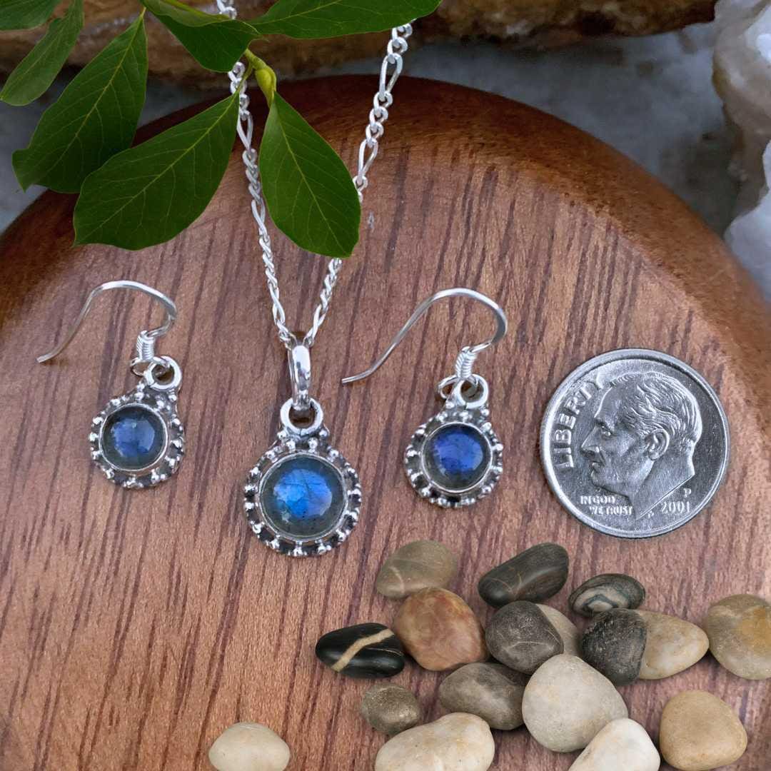 an image of a Dainty Sterling Silver and Labradorite Pendant and Earrings Set next to a dime