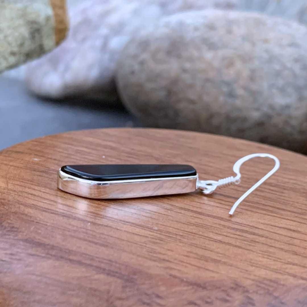 a side view of a Contemporary Black Onyx and Sterling Silver Earring
