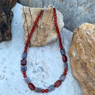 an image of a Carnelian and Grey Agate Beaded Necklace with rectangular grey agate beads alternating with rectangular carnelian beads and some round carnelian beads