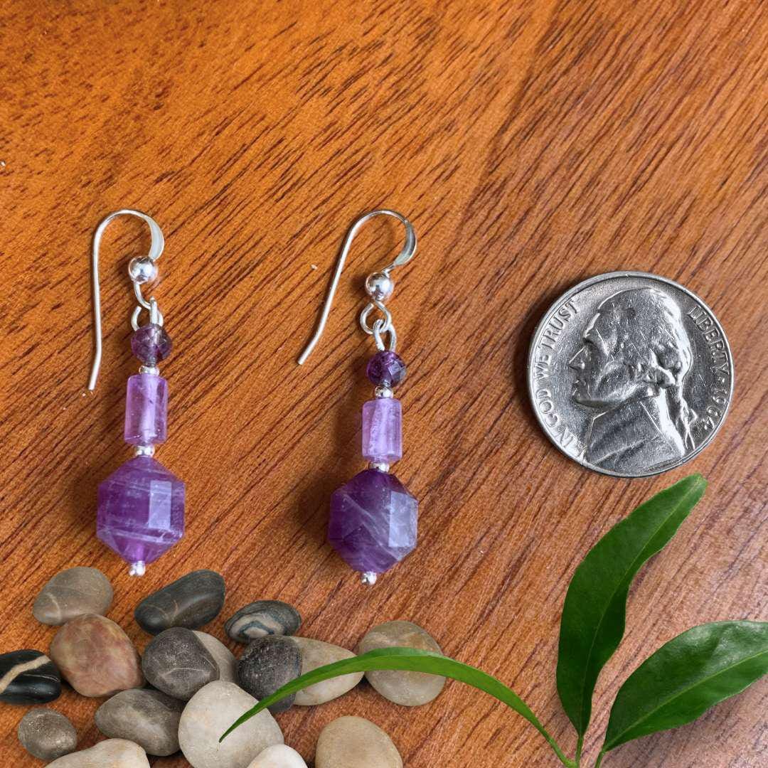 an image of a pair of Amethyst and Sterling Silver Mixed Beads Earrings next to a nickel