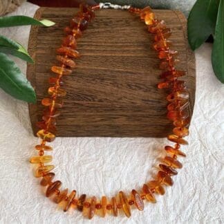 an image of an Amber Chips and Beads Necklace that is 19 inches long with a 1.5 extension chain in sterling silver