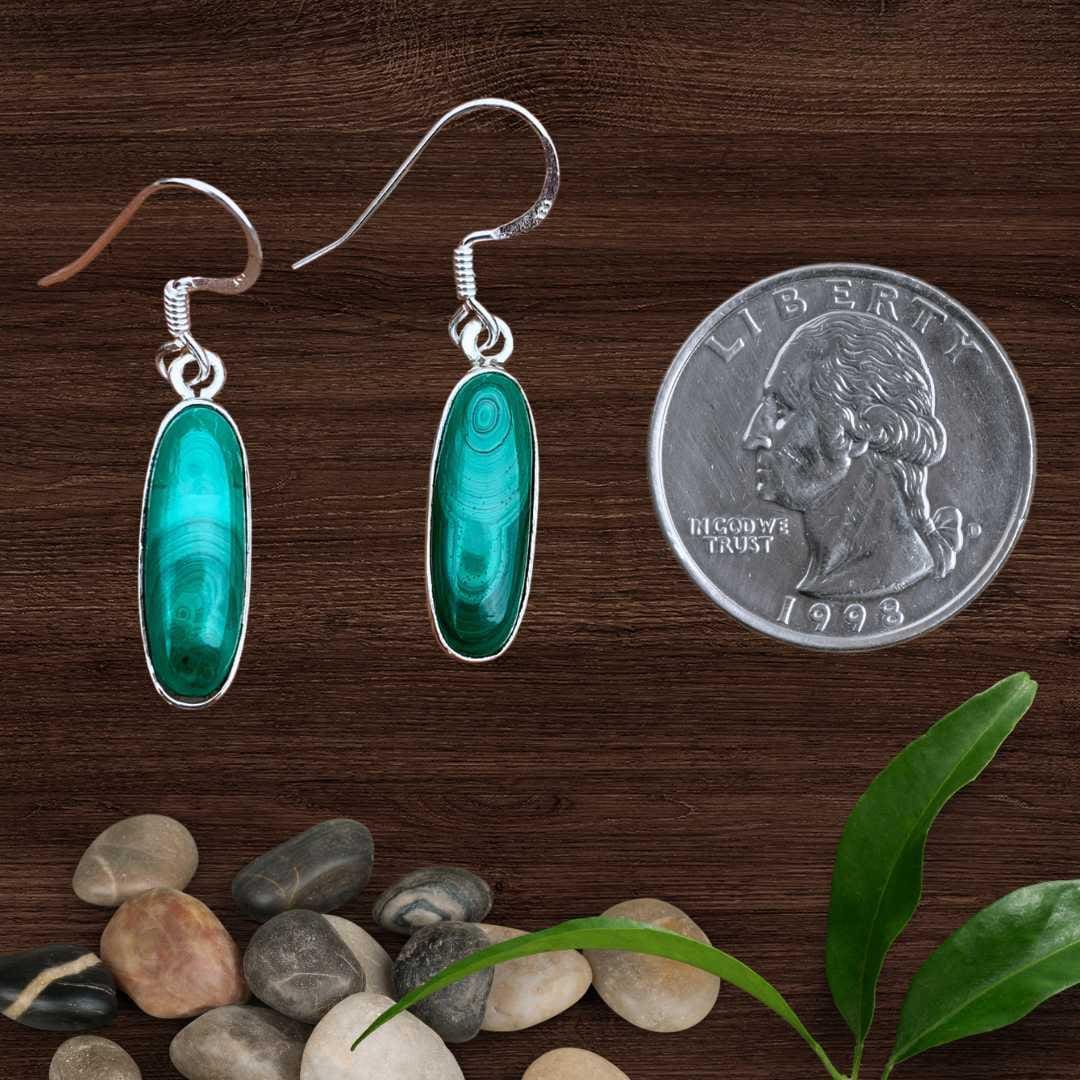 an image of a pair of Oblong Malachite and Sterling Silver Earrings next to a quarter