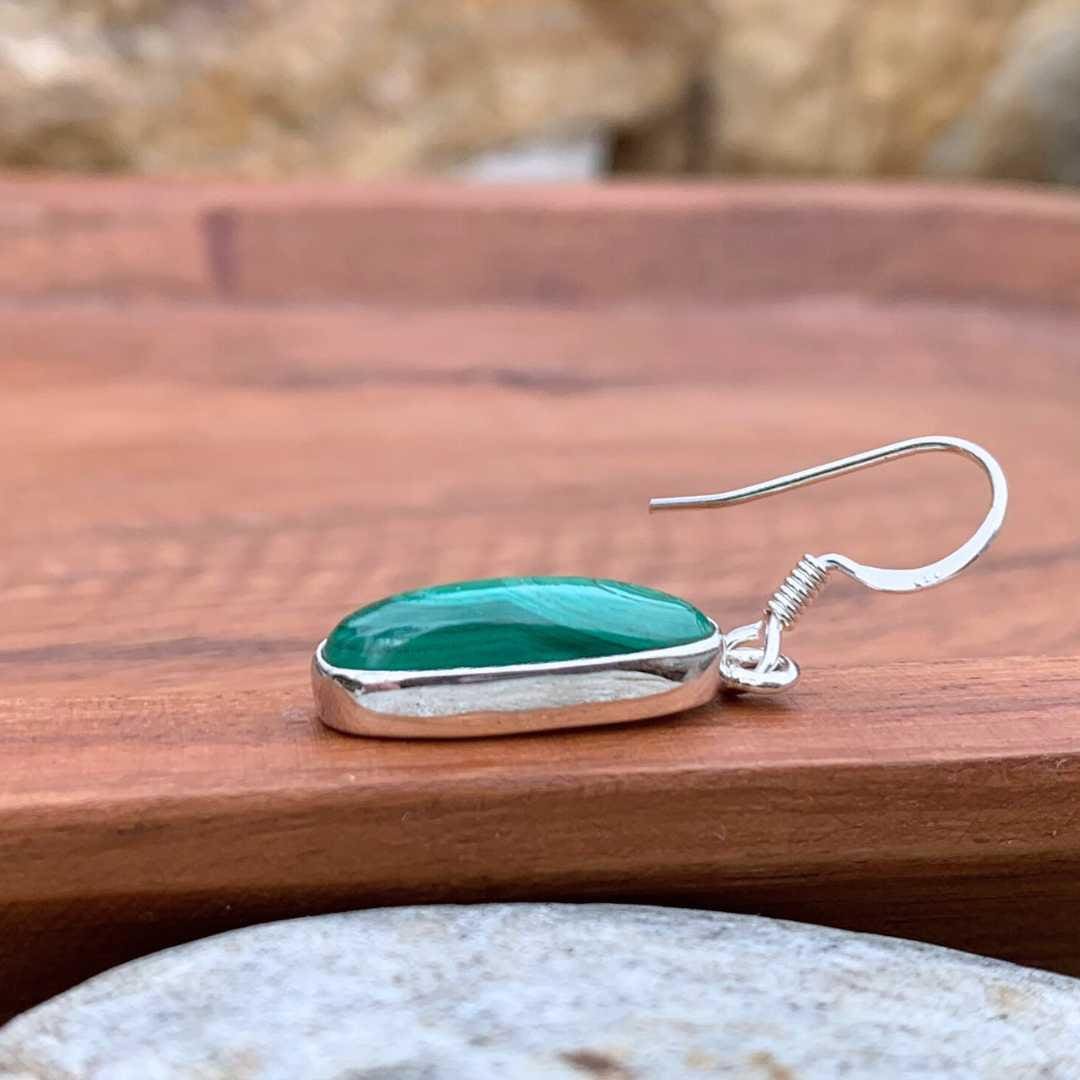 a side view of an Oblong Malachite and Sterling Silver Earring