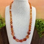 an image of a Faceted Oval Barrels Carnelian Beaded Necklace