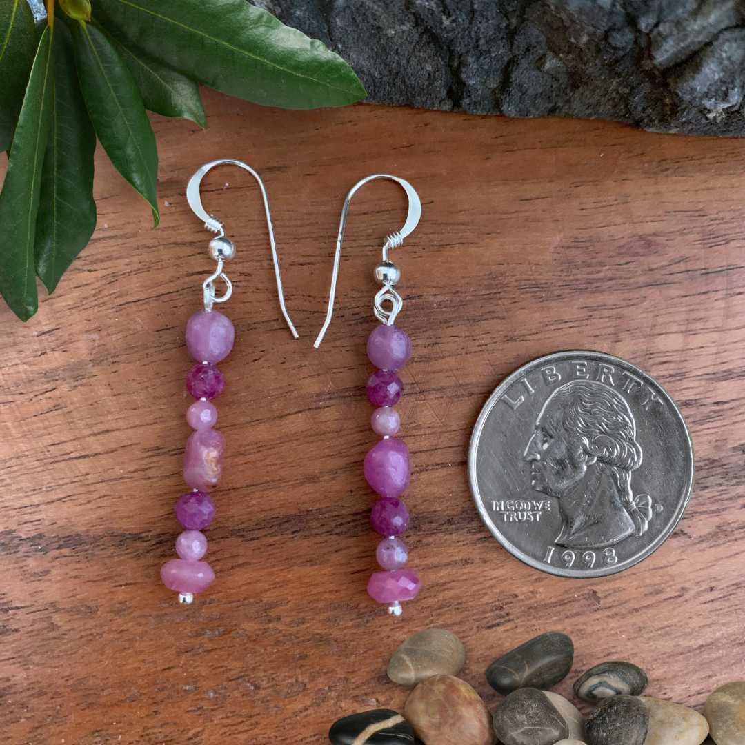 an image of a pair of Mixed Ruby Beaded Dangle Earrings next to a quarter