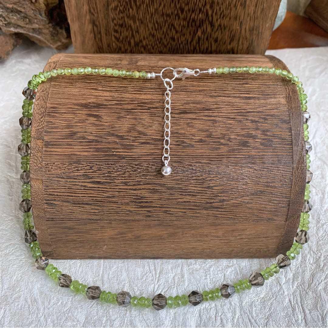 an image of a Peridot and Faceted Smoky Quartz Beaded Necklace showing the sterling silver clasp and extension chain