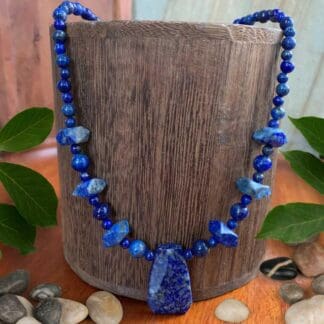 An image of a 19 inch long Lapis Lazuli Beaded Statement Necklace with a focal piece in the center