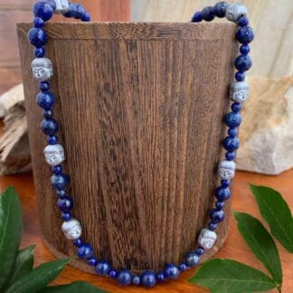an image of a Hematite Buddhas with Lapis Lazuli Necklace