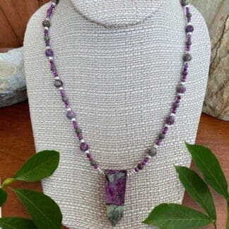 an image of a Atlantisite Stichtite with Hematite and Sterling Silver Necklace