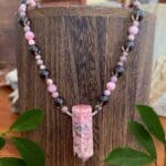 an image of a Rhodochrosite Pendulum and Smoky Quartz Necklace