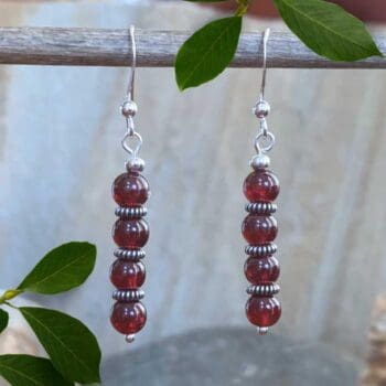 an image of a pair of Stacked Round Garnet Beads with Sterling Silver Earrings