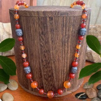 an image of a Beaded Carnelian and Hematite Buddha Necklace
