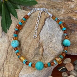 an image of a Mixed Amber and Turquoise Beaded Bracelet with sterling silver clasp