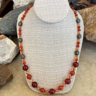 an image of a Beaded Carnelian and Hematite Buddha Necklace